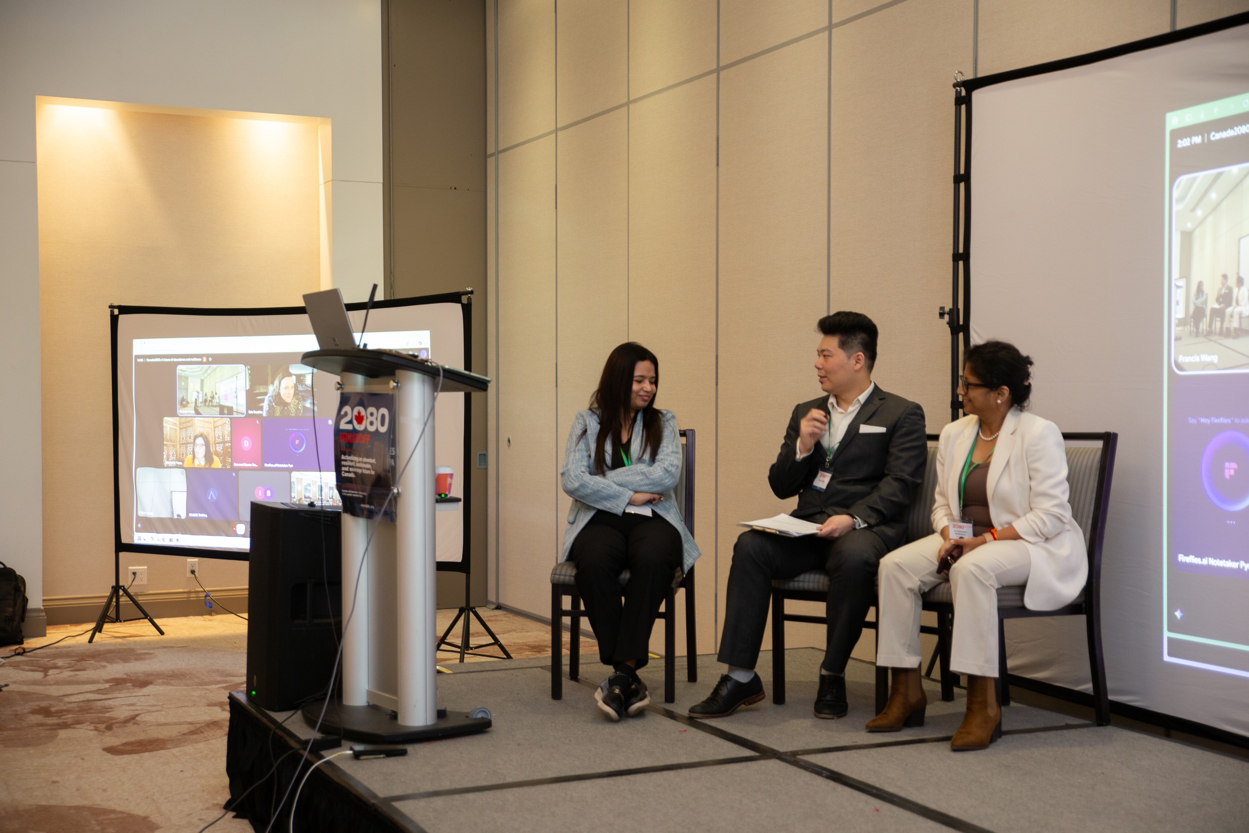 Sunita Kumari, Francis Wang, and Dr Sudarshana Bhattacharya seated for Panel 1, with remote speakers on the screen.