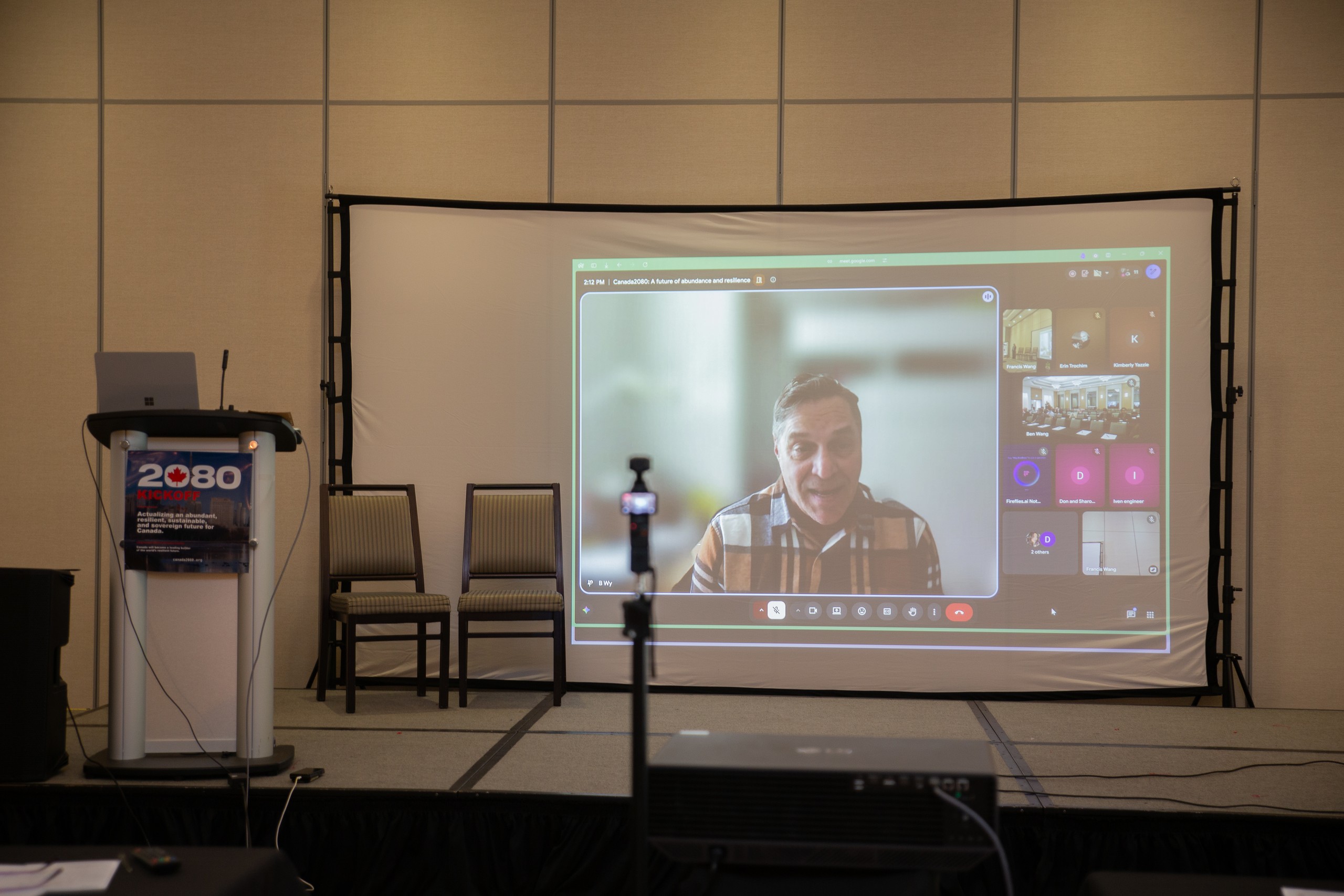 Barry Wylant on the screen, joining the kickoff remotely.